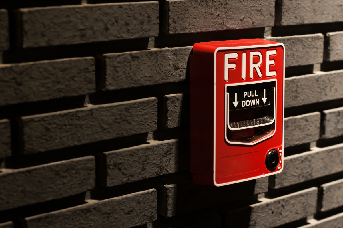 A fire alarm mounted on a wall
