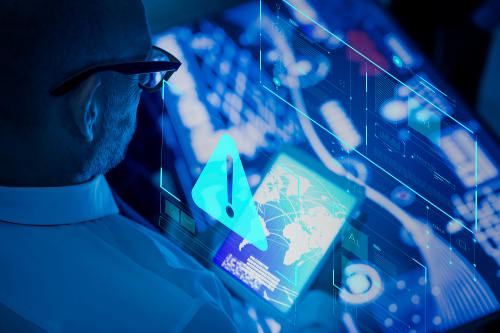 Man using advanced technology on a futuristic tablet display